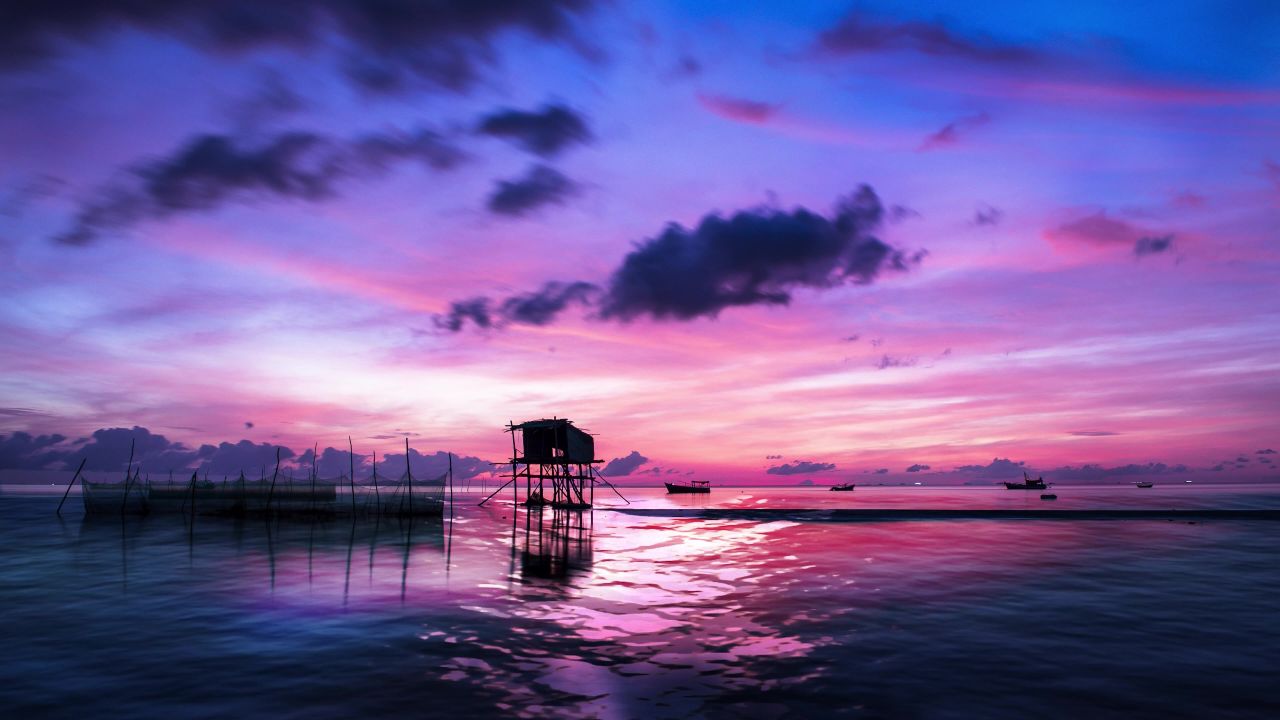 日落海洋水海自然日出船旅行灯塔晚上浪漫海景夏天云天空