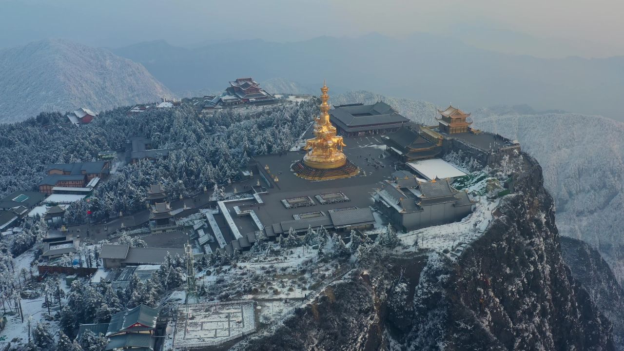 航拍冬天清晨的峨眉山金顶雪景及四面佛十方普贤菩萨铜像 1