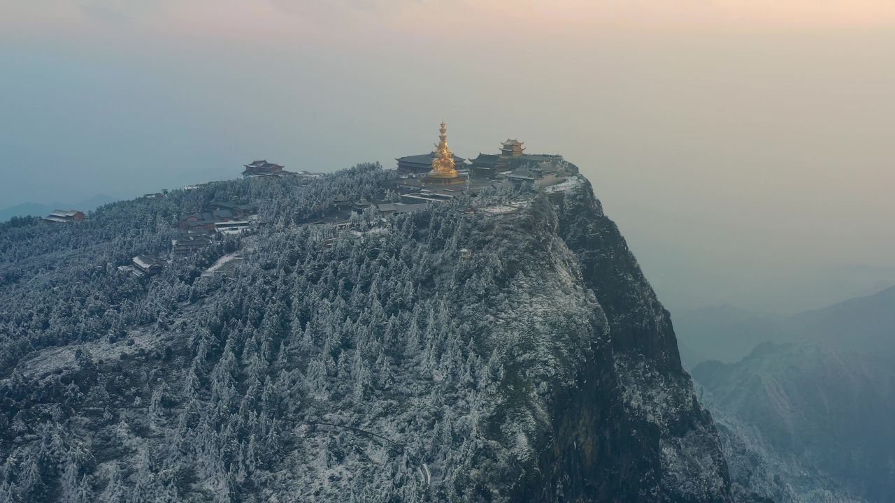 航拍冬天清晨的峨眉山金顶雪景及四面佛十方普贤菩萨铜像 1