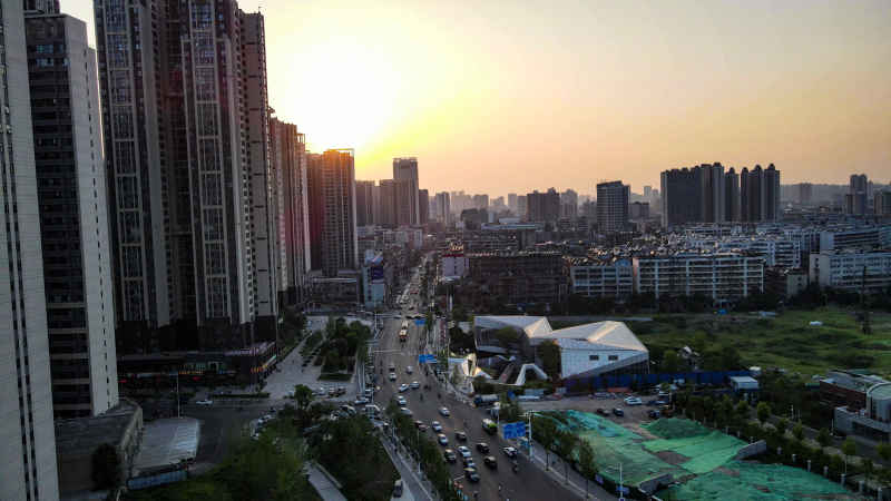 航拍城市夕阳交通高楼车辆  