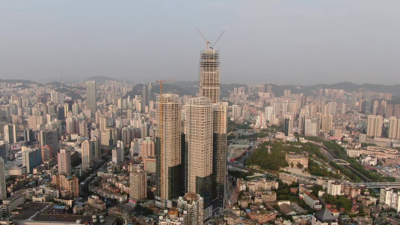 城市在建商务大厦盖楼吊塔航拍  