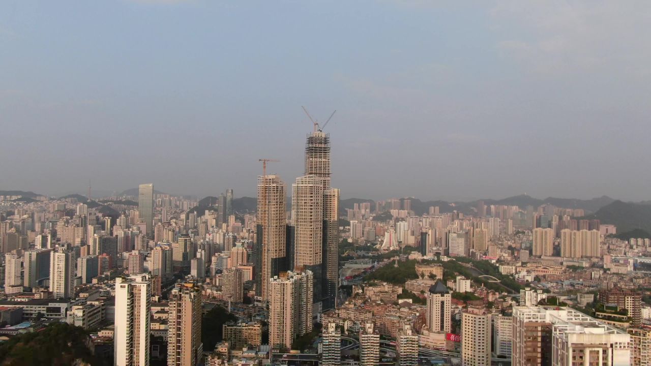 城市在建商务大厦盖楼吊塔航拍  